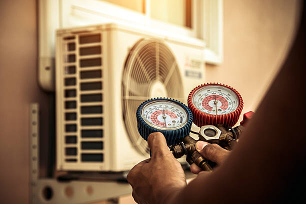 Professional Hvac Repair technician working in Champaign, IL